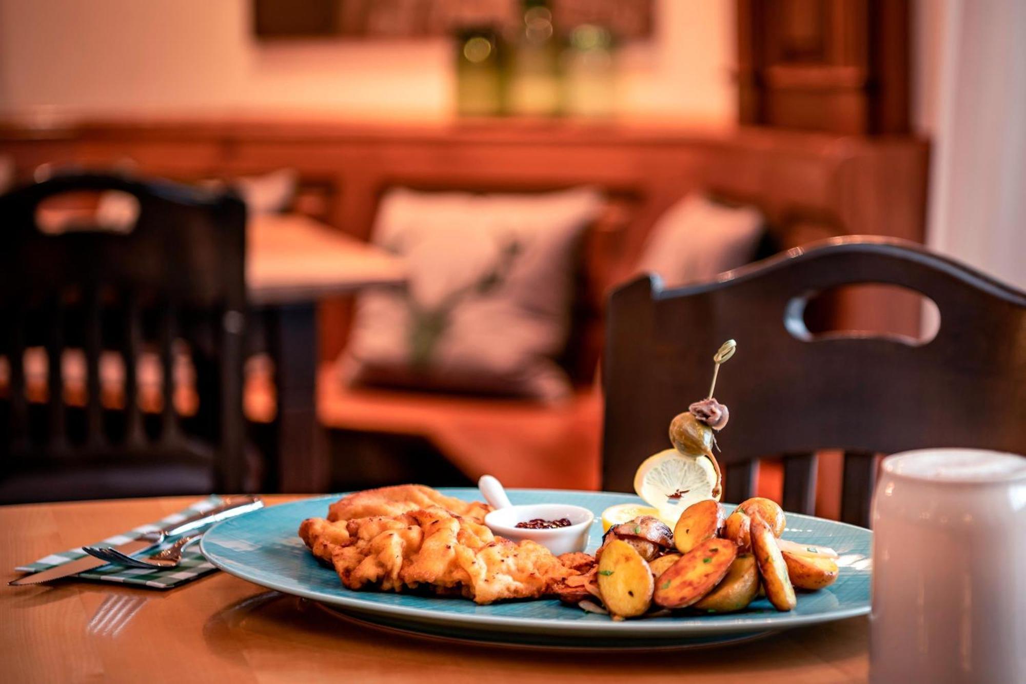 The Westin Grand Munich Hotel Exterior photo A plate of fish and chips